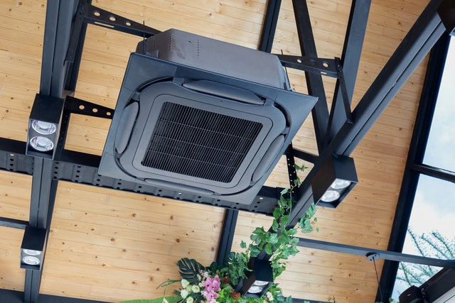 Modern ceiling mounted cassette type air conditioning system in